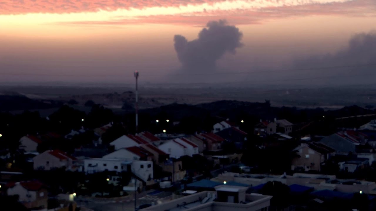 Huge smoke cloud drifts over northern Gaza at sunset