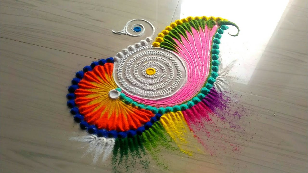 Rangoli designs for daily / peacock rangoli 285