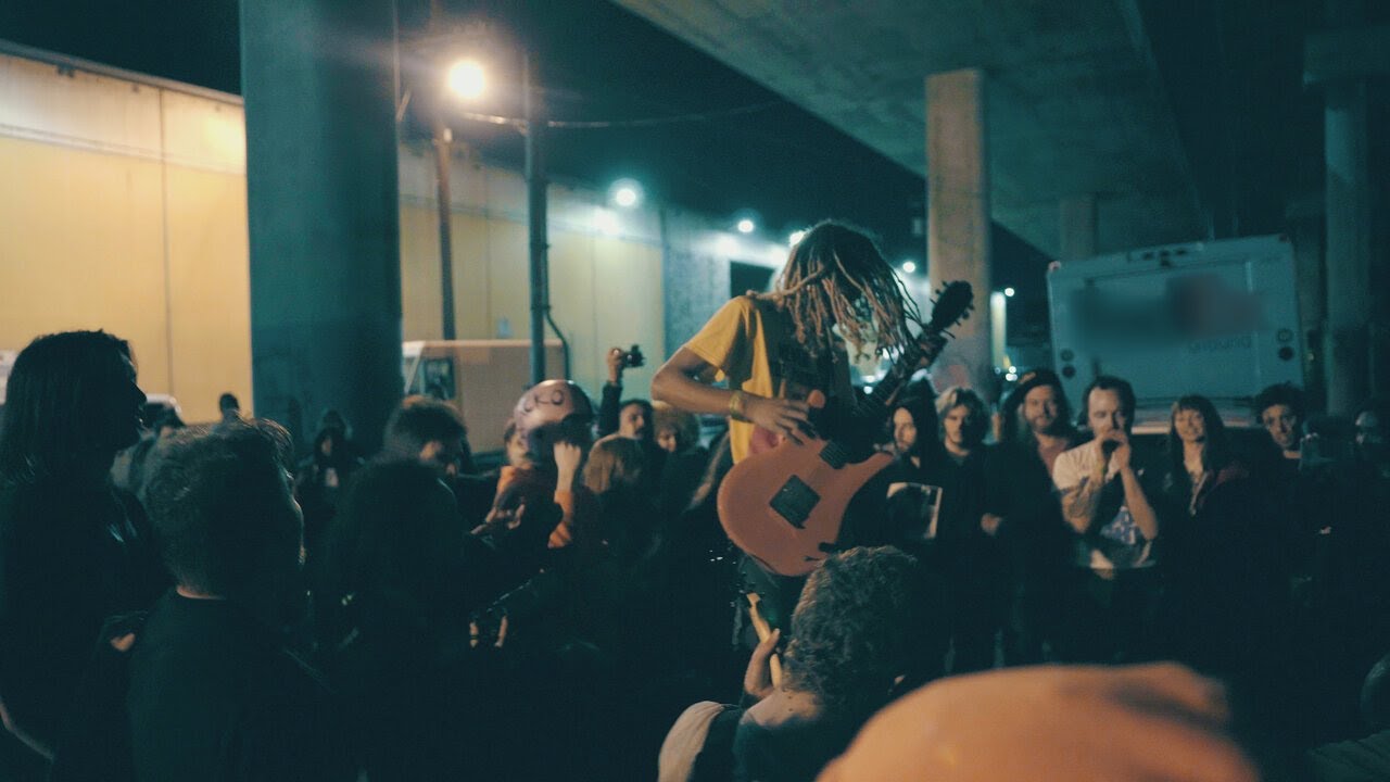WACKO PERFORMS UNDER A FREEWAY