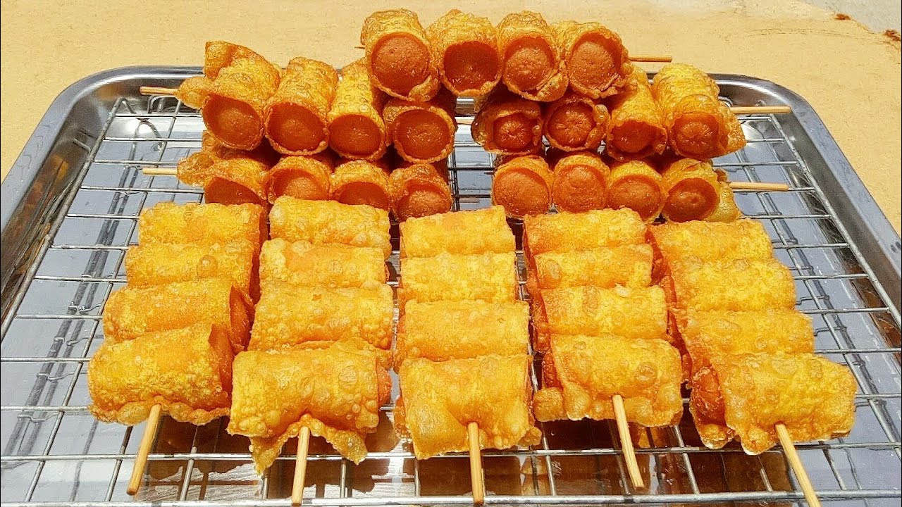 เกี้ยวพันไส้กรอกทอด ทอดยังไงให้ฟูกรอบไม่อมน้ำมัน ทำกินทำขายได้เลยจร้า