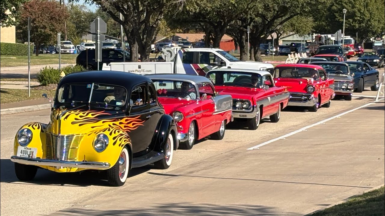 Cars leaving Mustang Sally Productions Car Show in The Colony TX