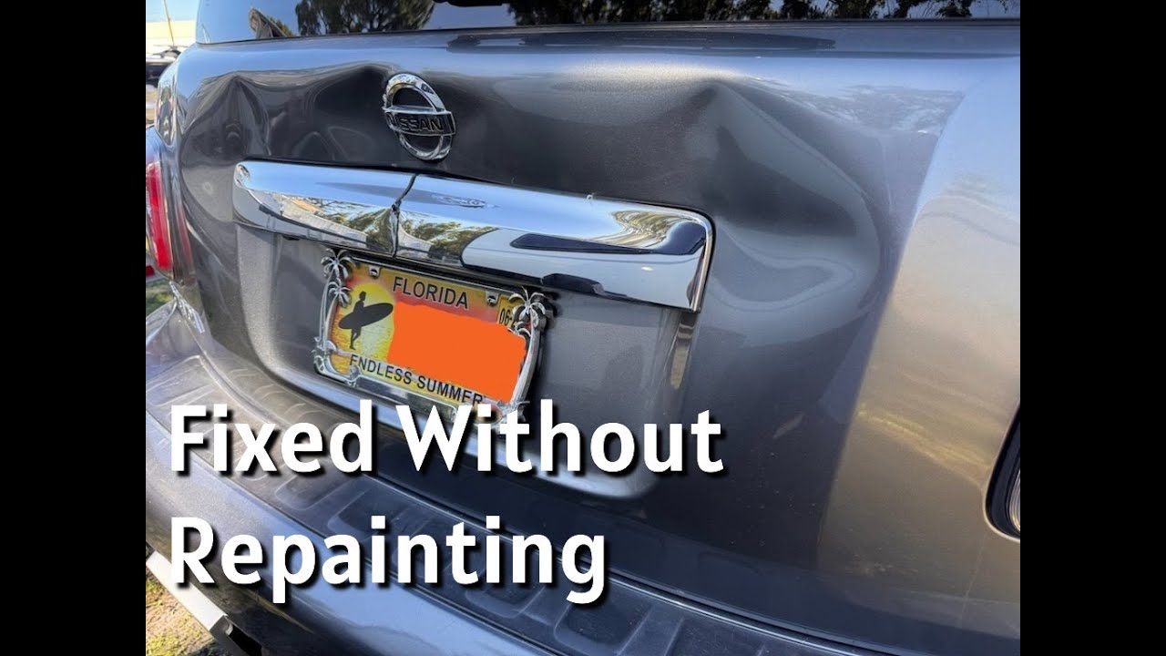 Nissan Armada trunk lid paintless dent repair