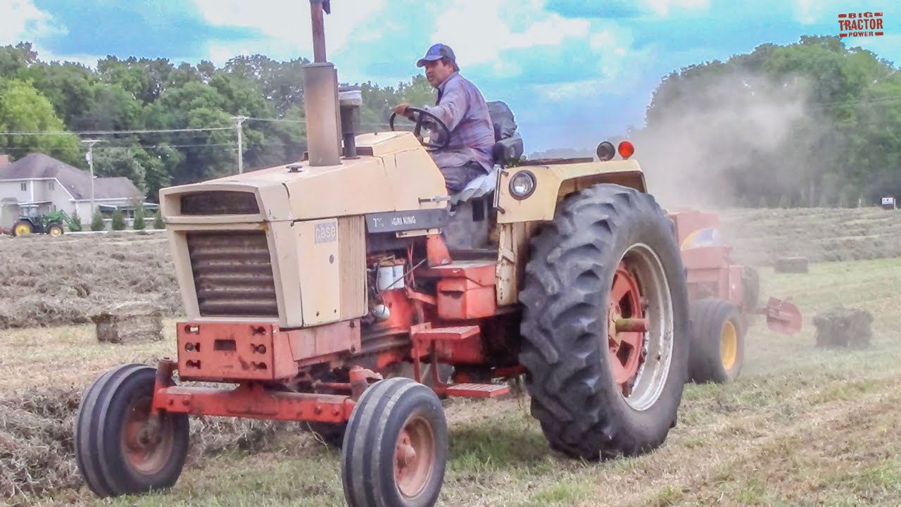 CASE TRACTORS HARVESTING HAY