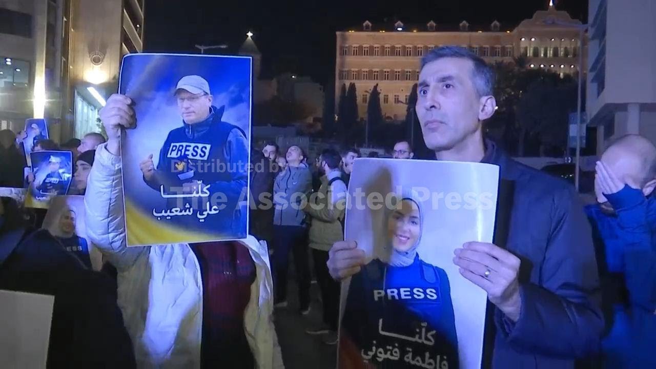 Protesters march in Beirut condemning killing of journalists in south Lebanon
