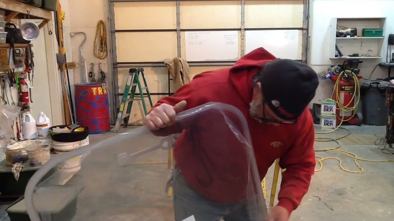How to install the windshield on a Kubota SVL-95.