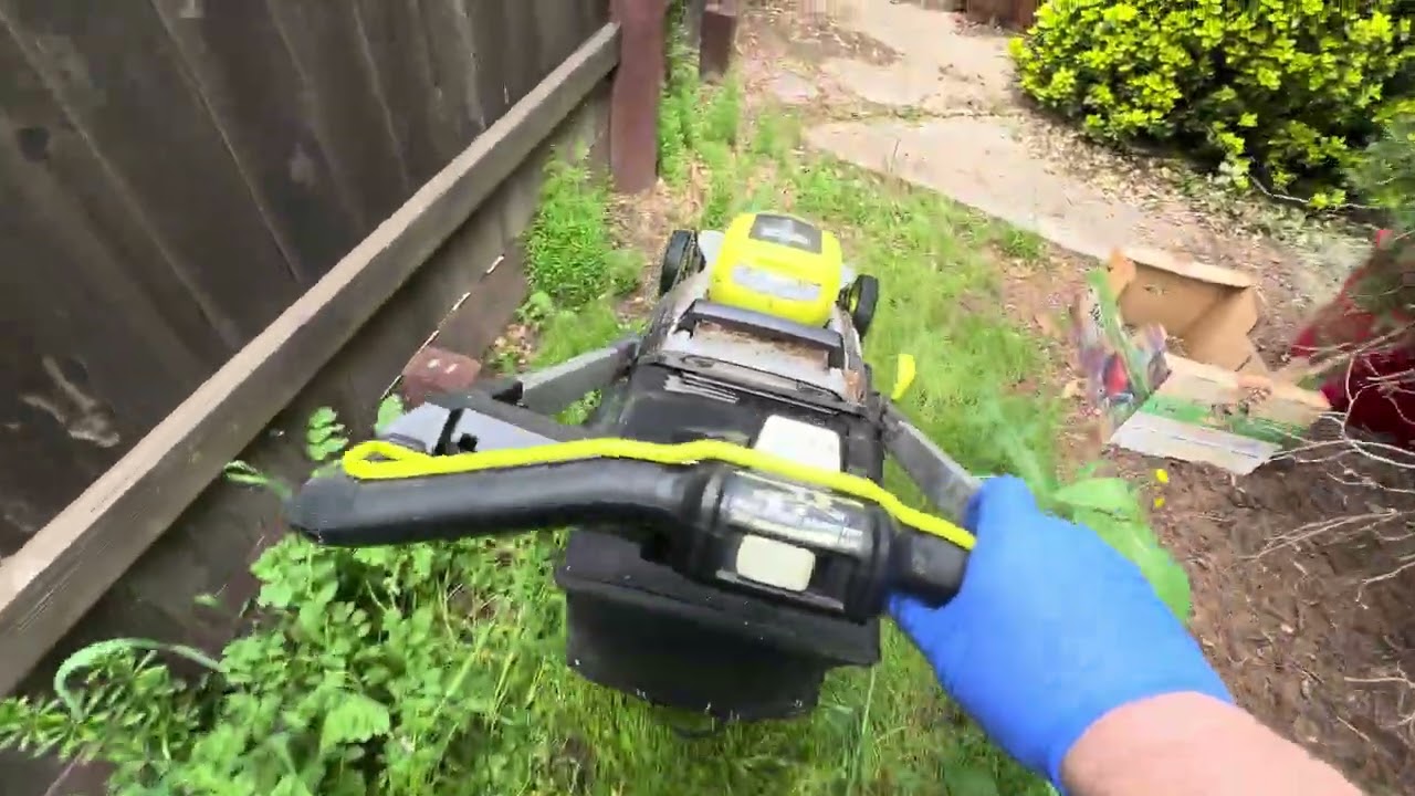 Mowing front yard after long winter 2026.  Tall grass vs mower!  