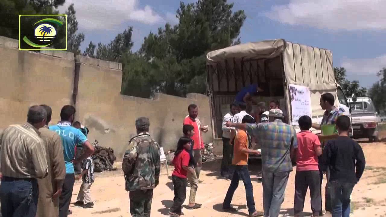 منادي الخير-ضمن حملة ولهم منا تمرات - توزيع التمور في بلدة كفر جالس-ادلب-سوريا 13-6-2015