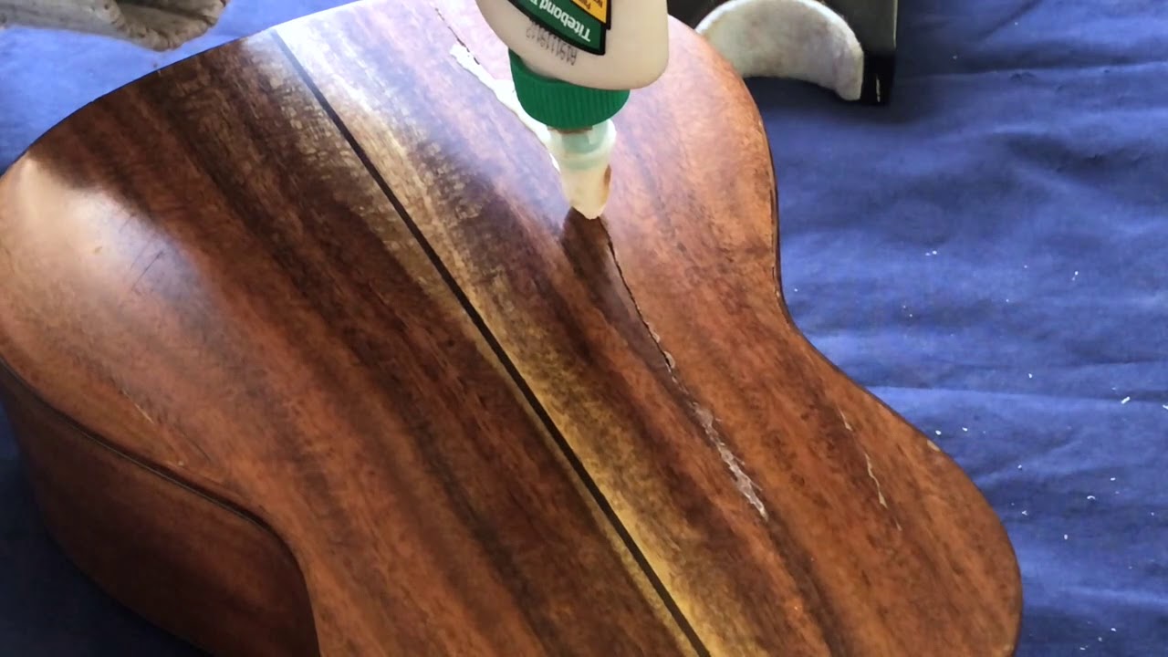 Lanikai Ukulele - Eternal. A high quality, mother of pearl and abalone uke with a broken back.
