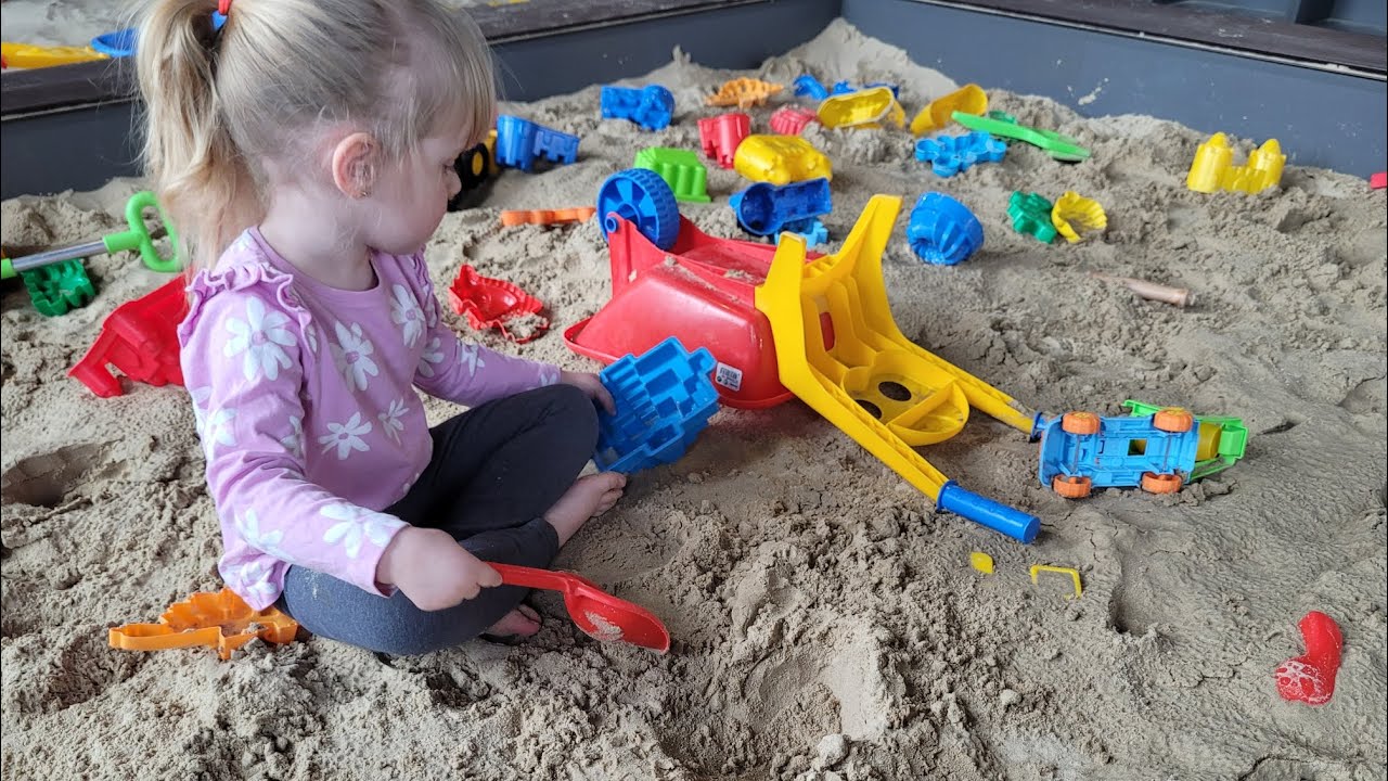 Emilka and Aurelka have fun playing at Indoor Sand Playground for kids