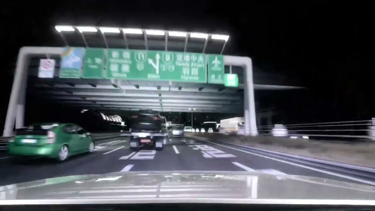 BMW 330i Cutting Through the Heavy Traffic On the Japanese Highway
