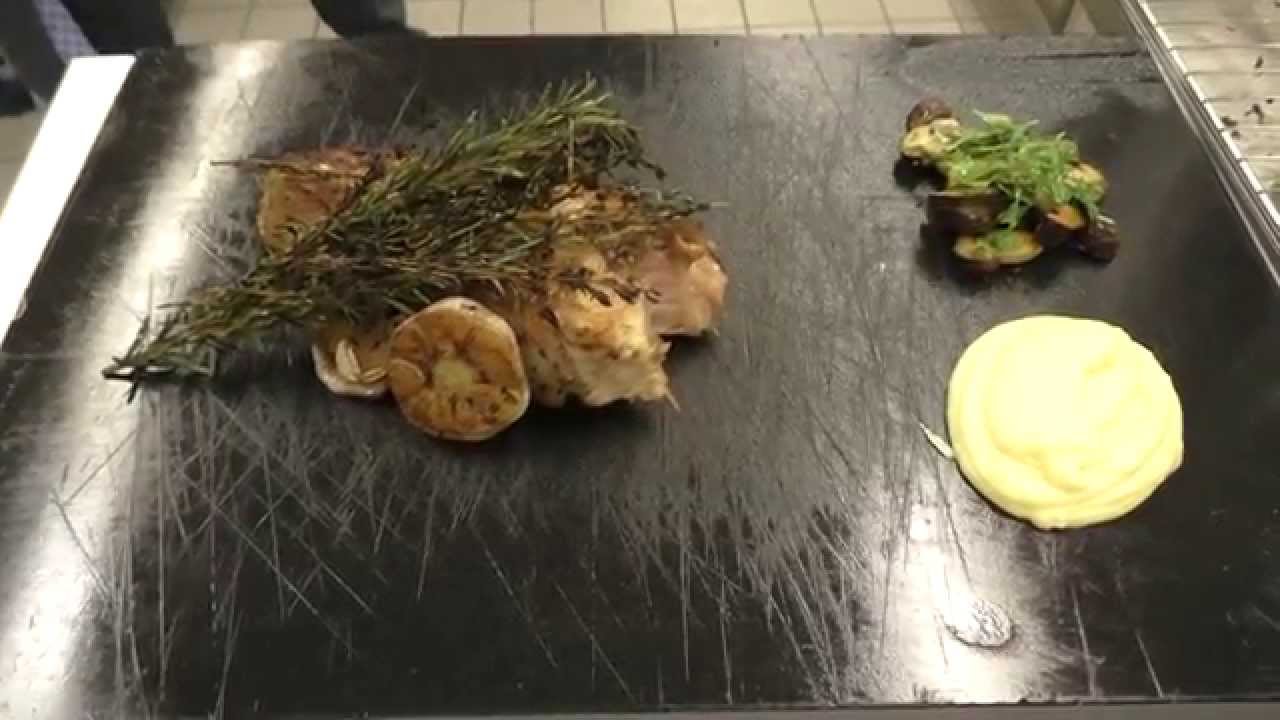 Lohse prepares a main course at the Michelin star Fischers Fritz