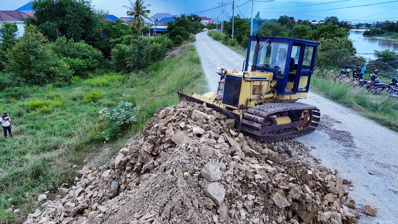 Amazing Bulldozer starts new project landfill with dump trucks 