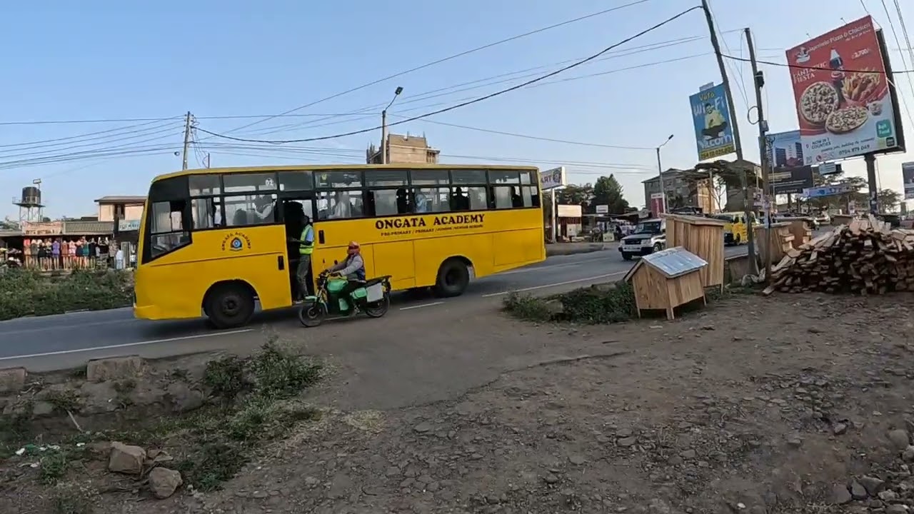 When  traffic blocks your path, plan B comes in Multimedia University's footpath 