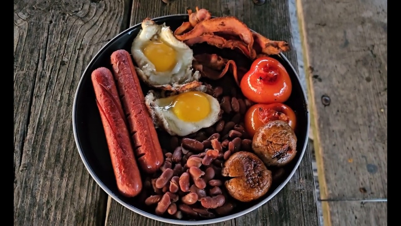 Preparing English Breakfast on campfire