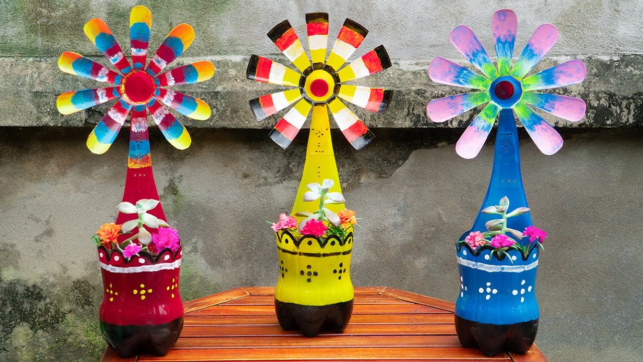 Recycle old plastic bottles to make beautiful windmill flower pots to decorate your home
