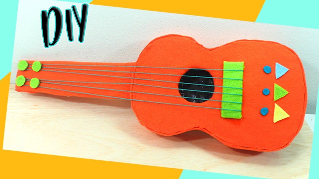 COMO HACER UNA GUITARRA DE CARTÓN RECICLADO 🎸