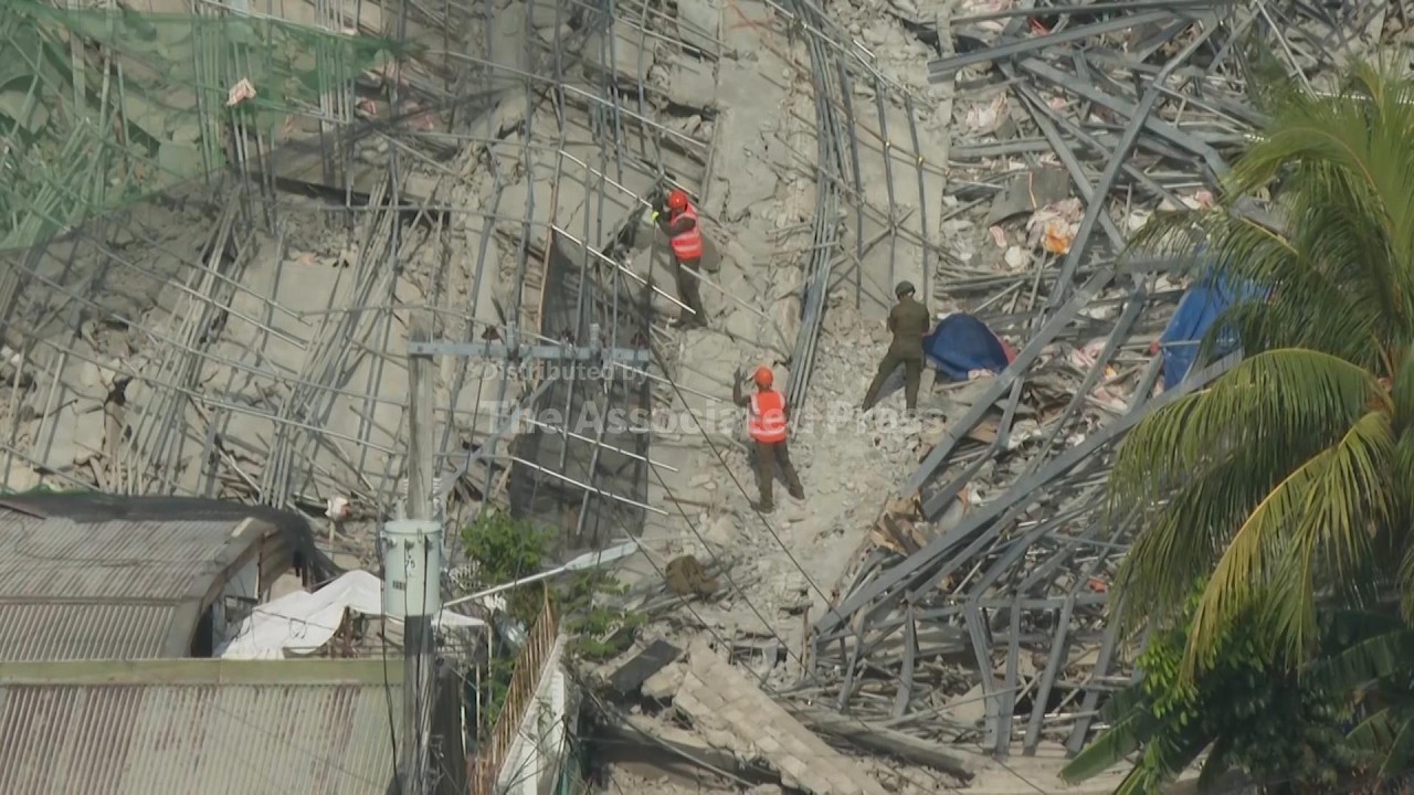 Building under construction in Philippines collapses, leaving 1 dead and 21 trapped