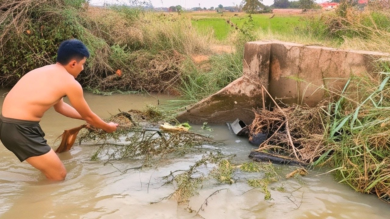 The Dry Season Is Has Come To Us Remove Debris Clogged Culvert Drain In Canal To Farm