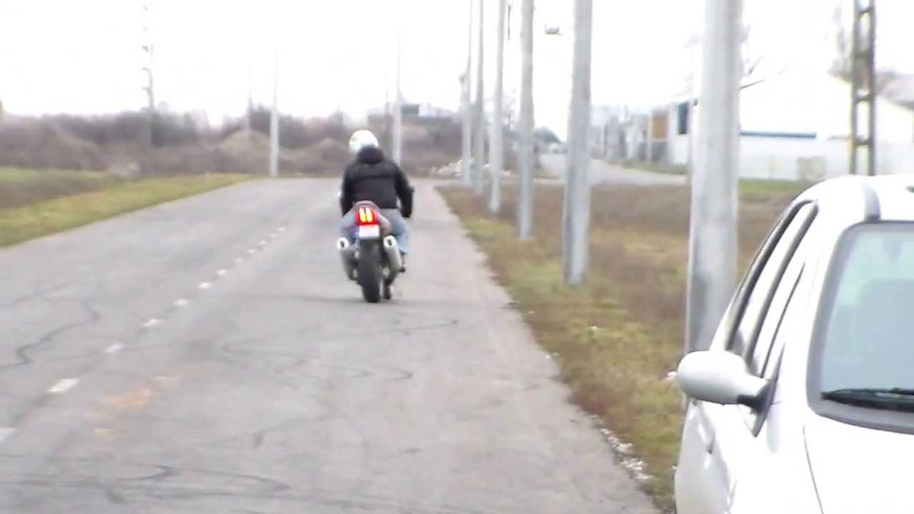 Suzuki SV1000S stoppie and wheelie