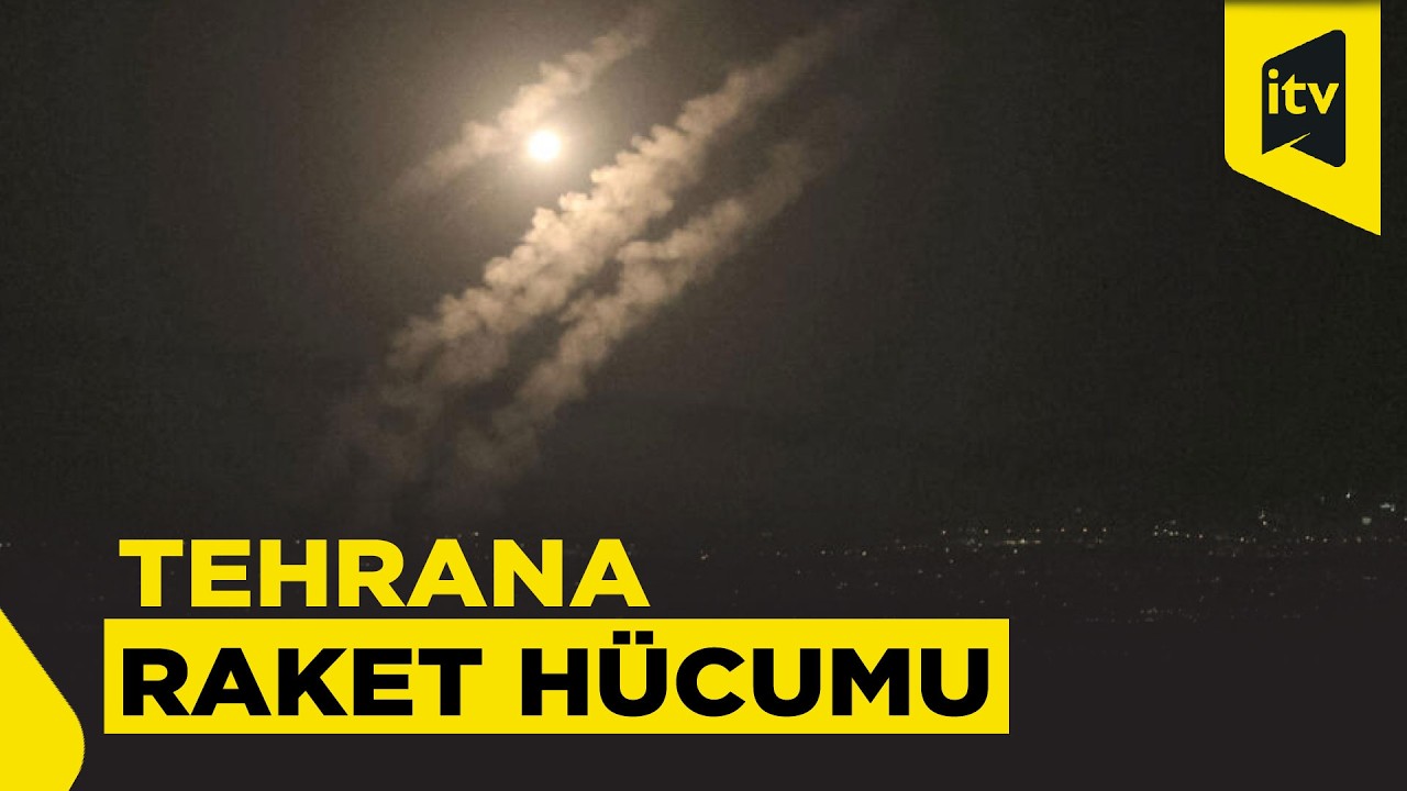 Tehranın səmasında raketlərin uçuşu və partlayış anları