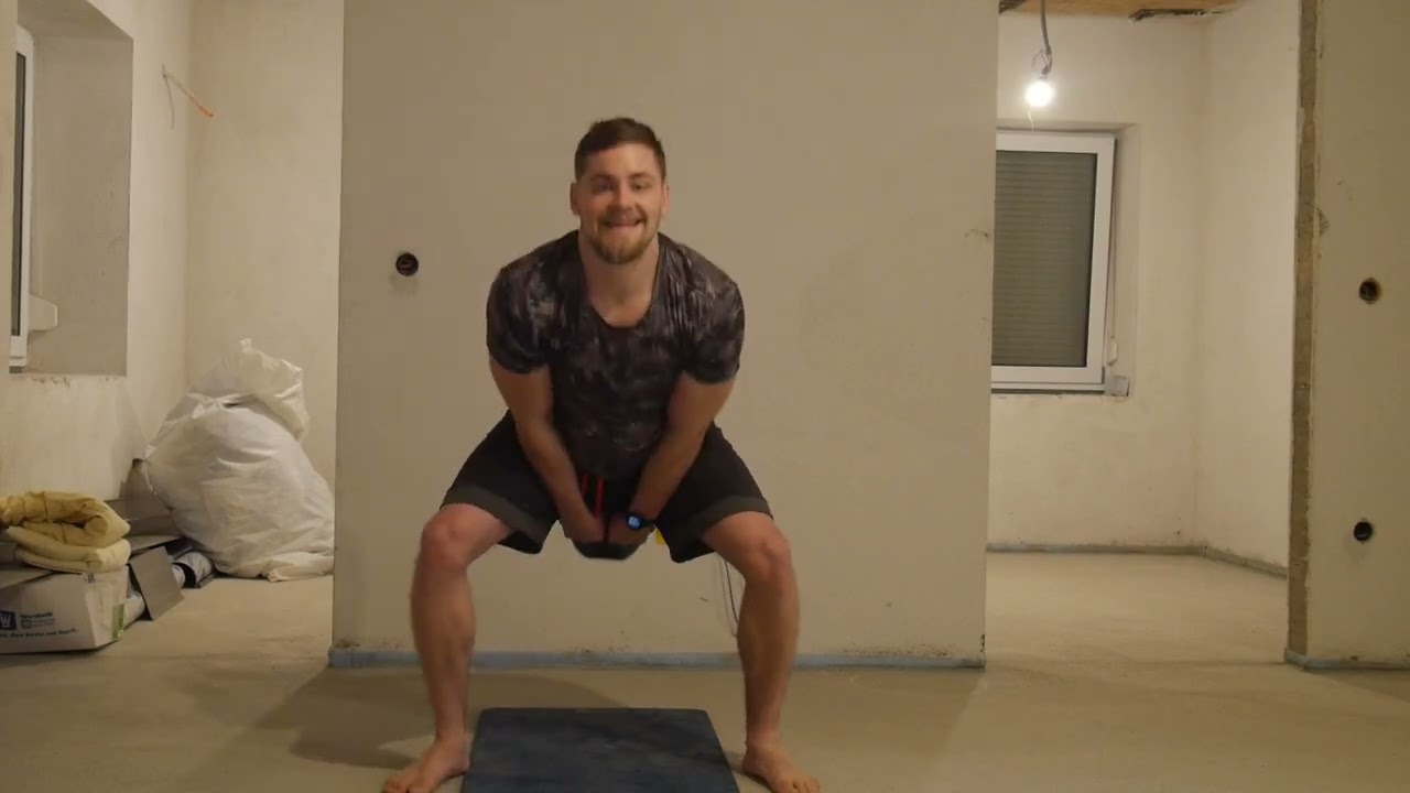 200 Kettlebell swings (20kg), 100 Pushups, 50 Squats (20kg)