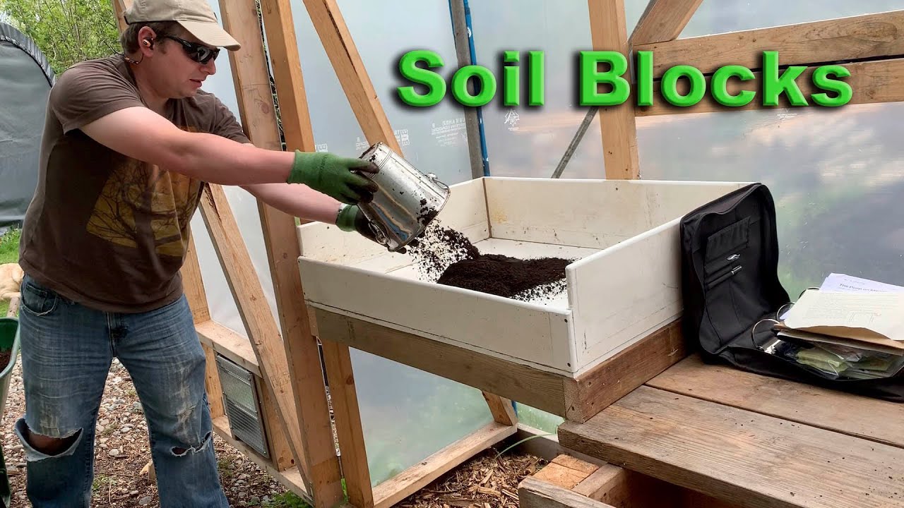 Making a soil blocking / soil mixing table.