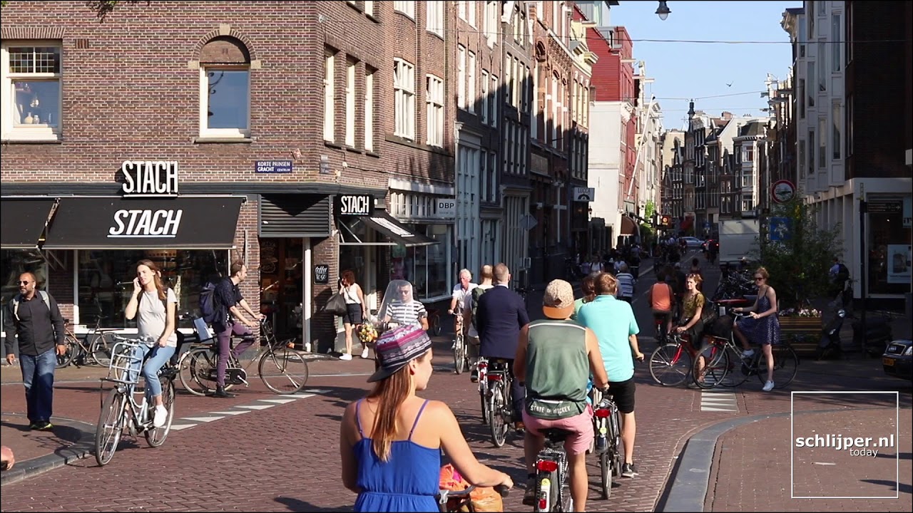 Unbelievably busy bicycle crossing in Amsterdam