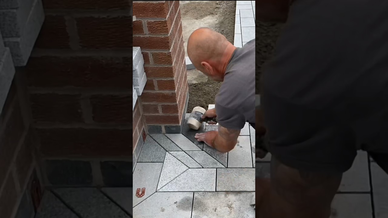 Cutting in at the end of this granite drive. Tapered cuts to meet the pavement threshold ⚒️ #home