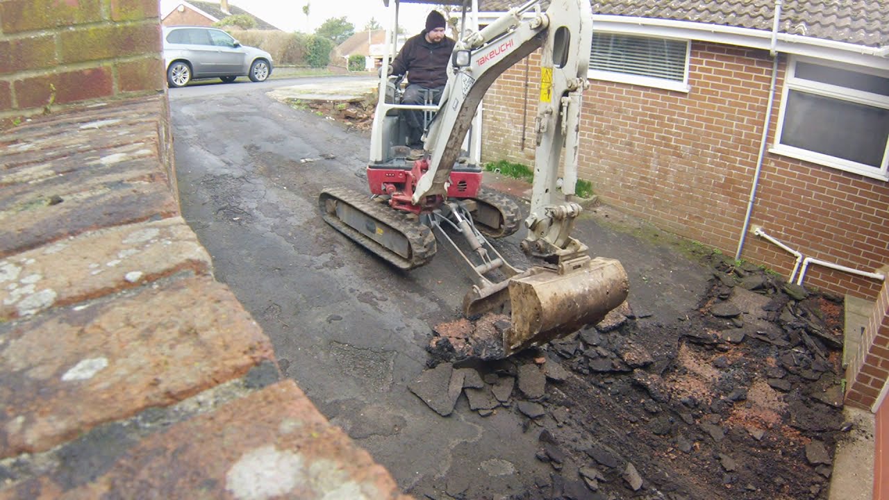 Digging up a Tarmac Driveway with Takeuchi TB216 Excavator or mini digger