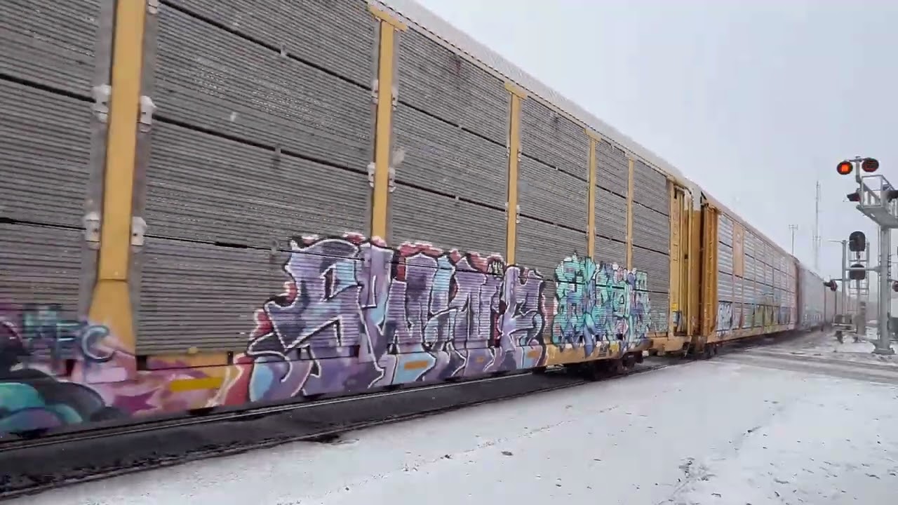 Norfolk Southern 10E Does the Snowstorm Shuffle Down the Middle of the Street