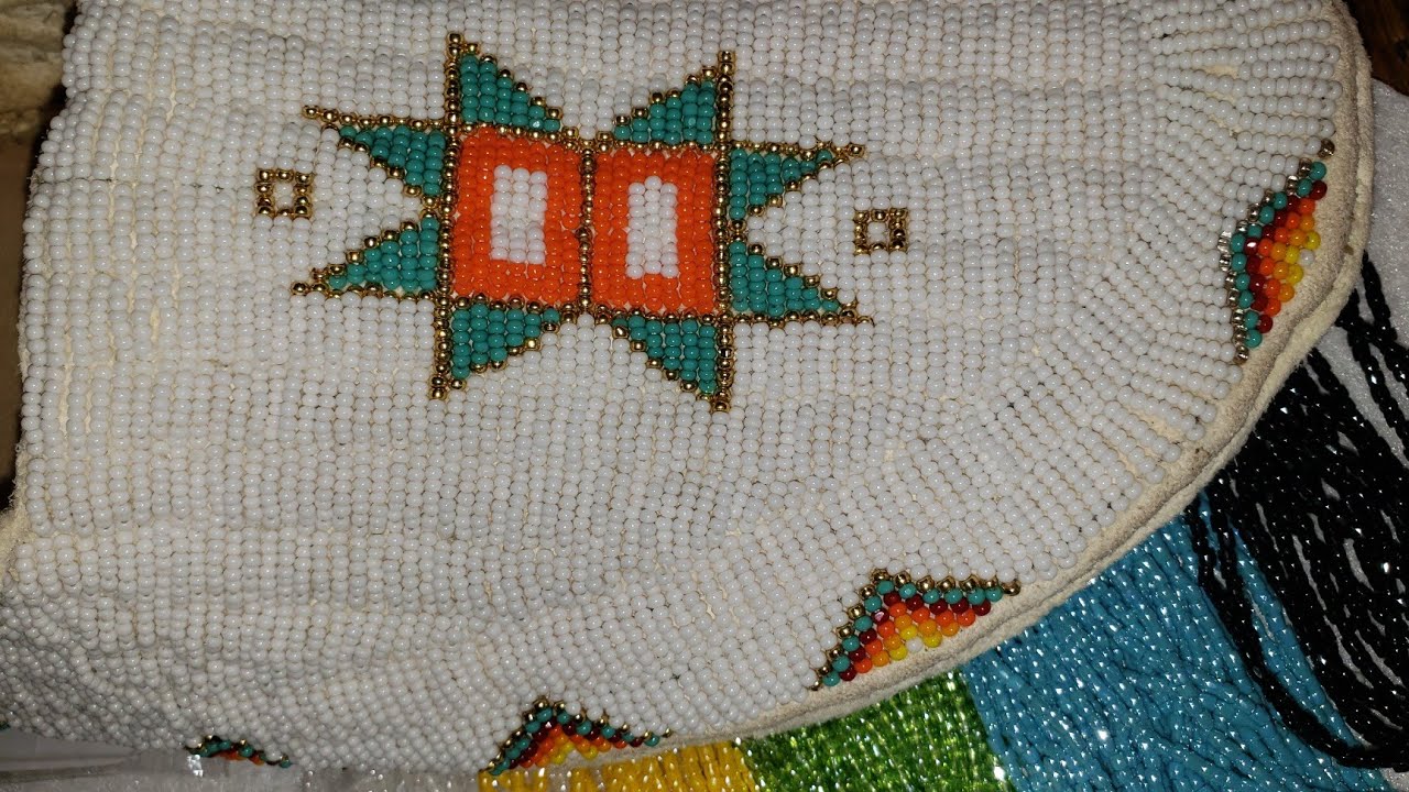 Beading my moccasins
