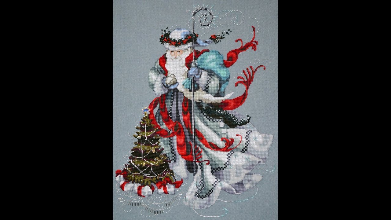 37 - Готовая вышивка Winter White Santa by Mirabilia