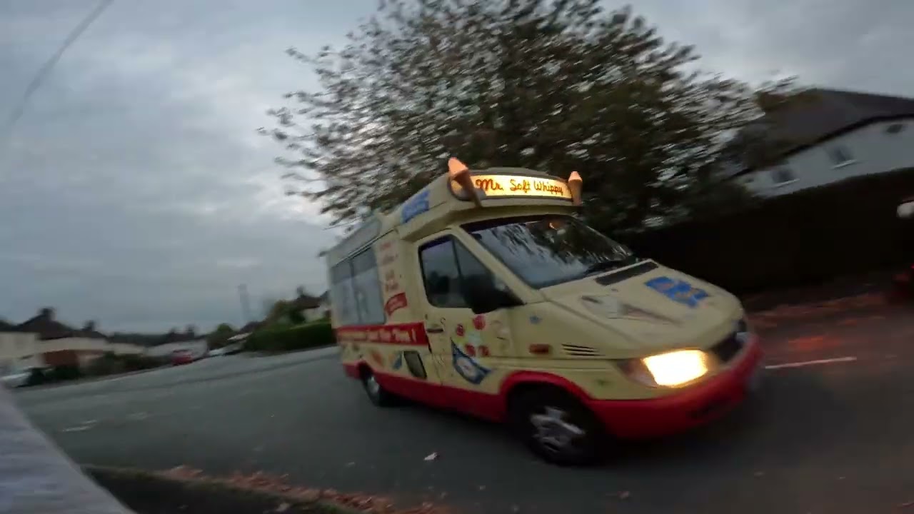 ice cream van with the cone lights on