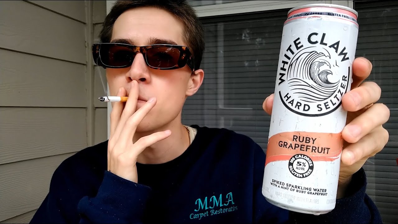 Smoking a Cigarette while Drinking a White Claw Hard Seltzer