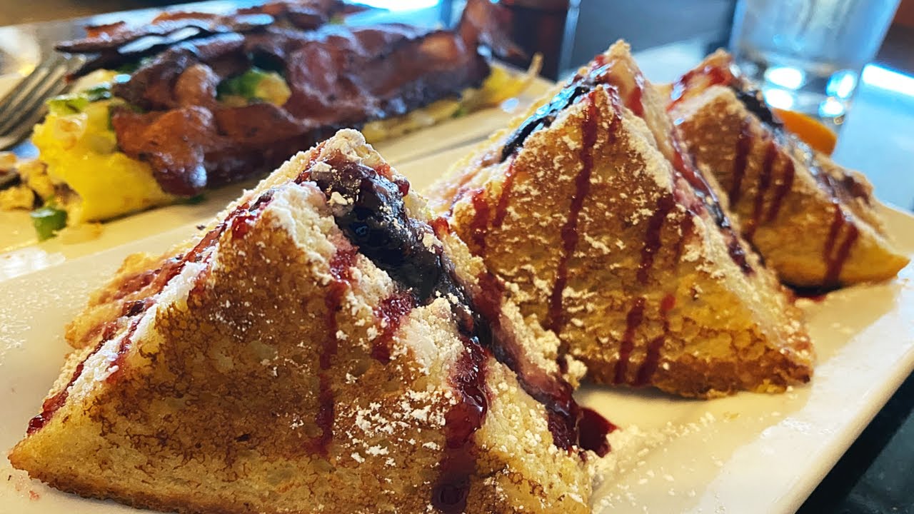 Raspberry Stuffed French Toast and Cheese Steak Omelette?! Keke's Breakfast Cafe Review!
