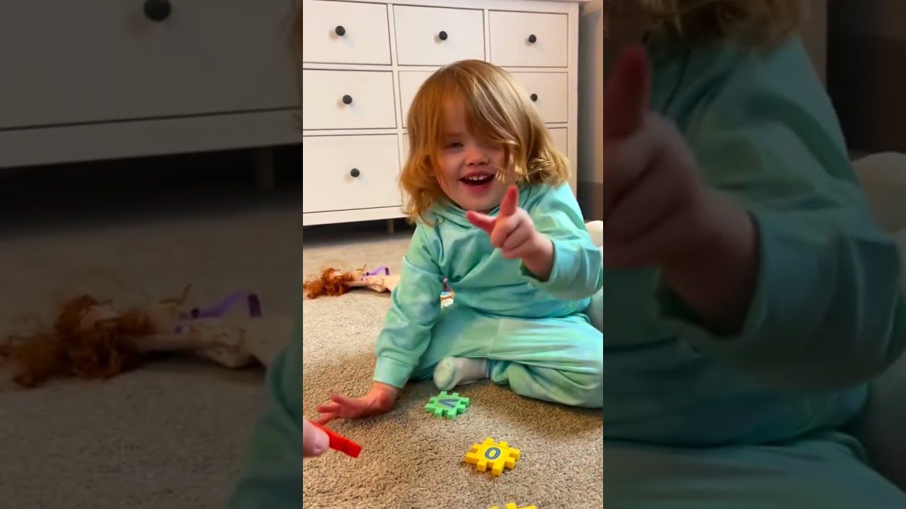 Baby Laughing at Pet