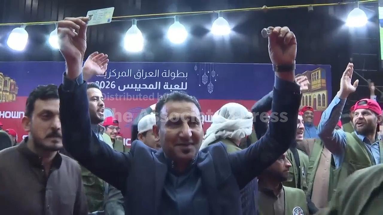 Iraqis congregate to participate in a Ramadan special: a hidden ring game
