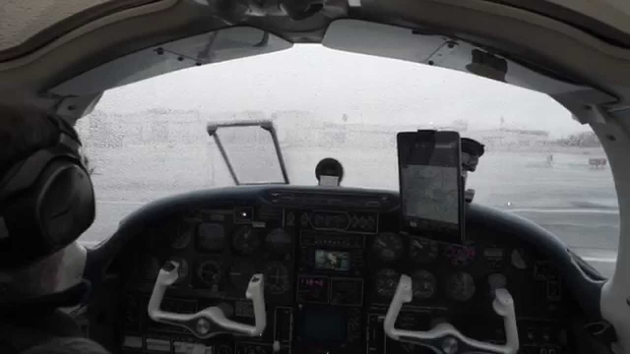 Instrument clearance and departure in bad weather with ATC audio.