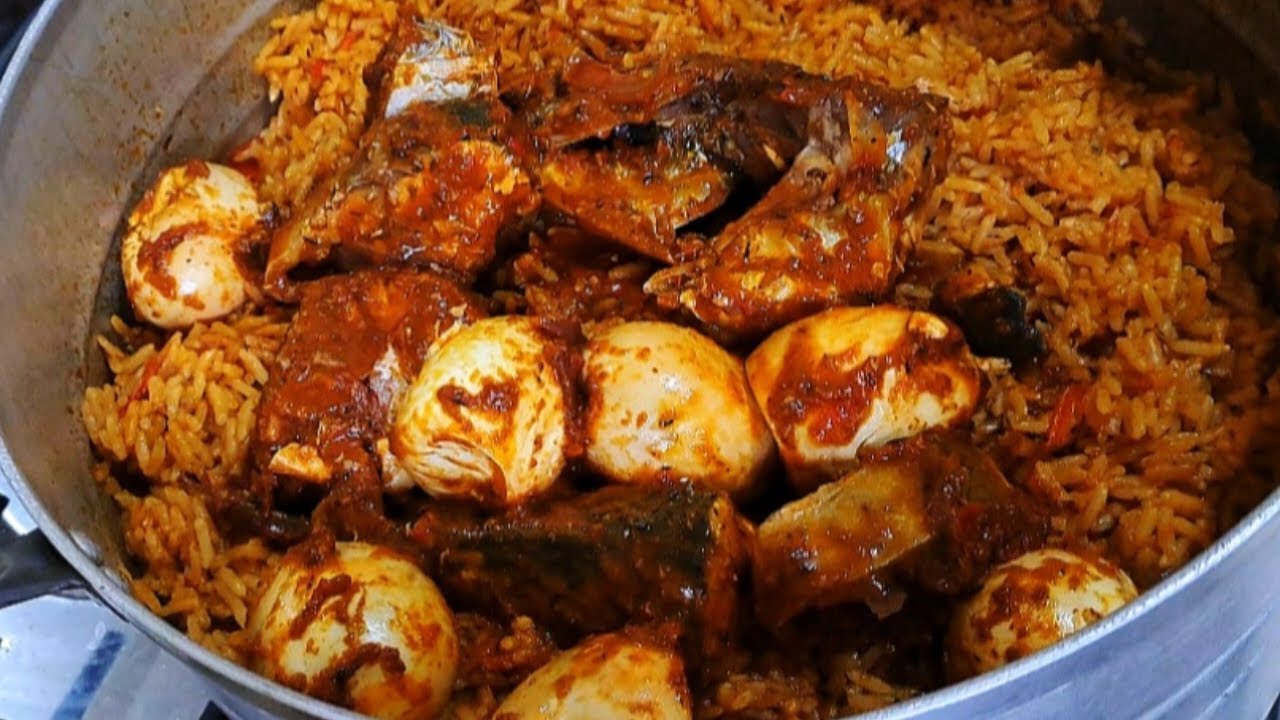 How to cook a low-budget Nigerian jollof rice, with boiled eggs and mackerel fish.
