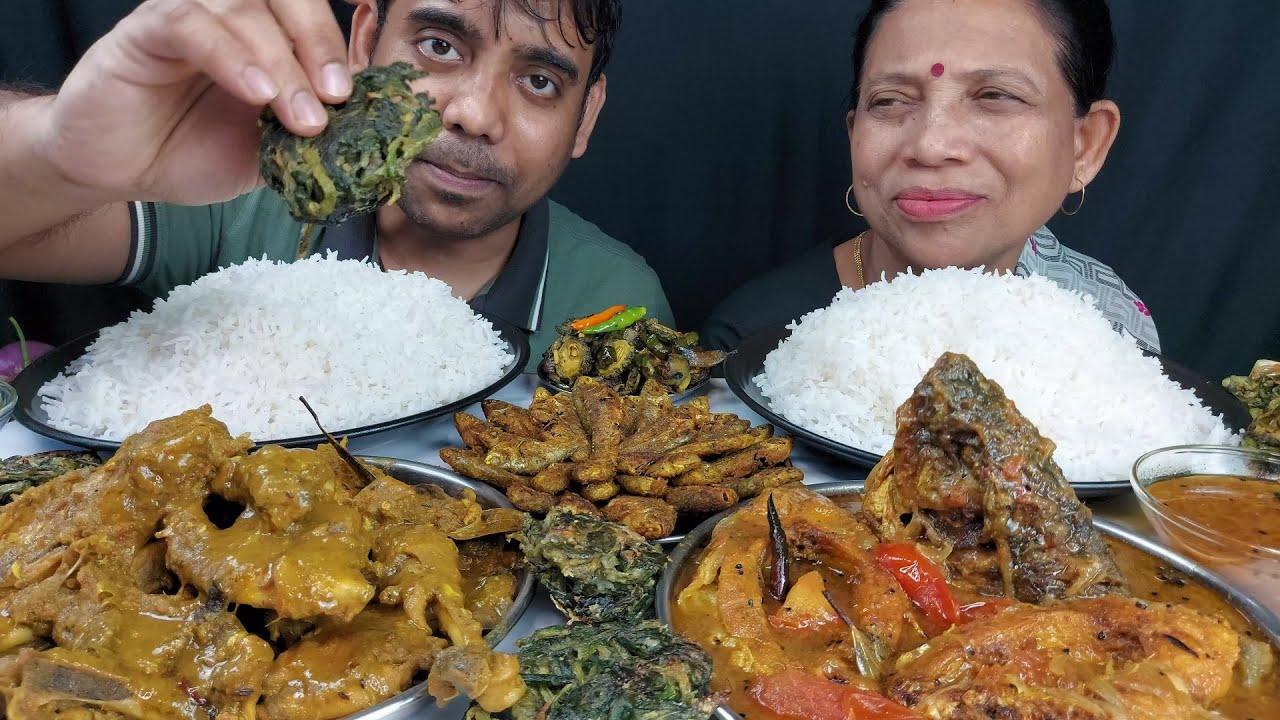 Chicken , Fish and Vegetable Eating With Rice