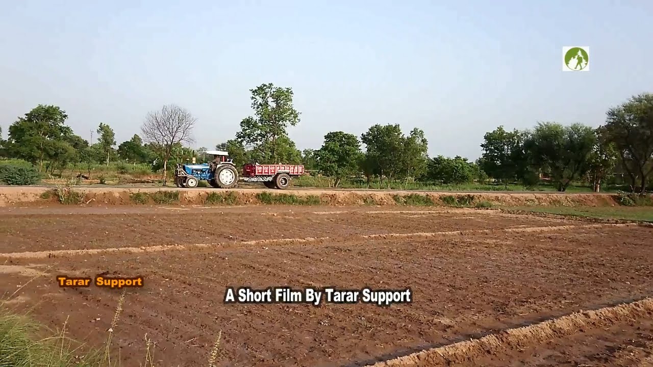 Rural Pakistan Ford Tractor On Village's Road