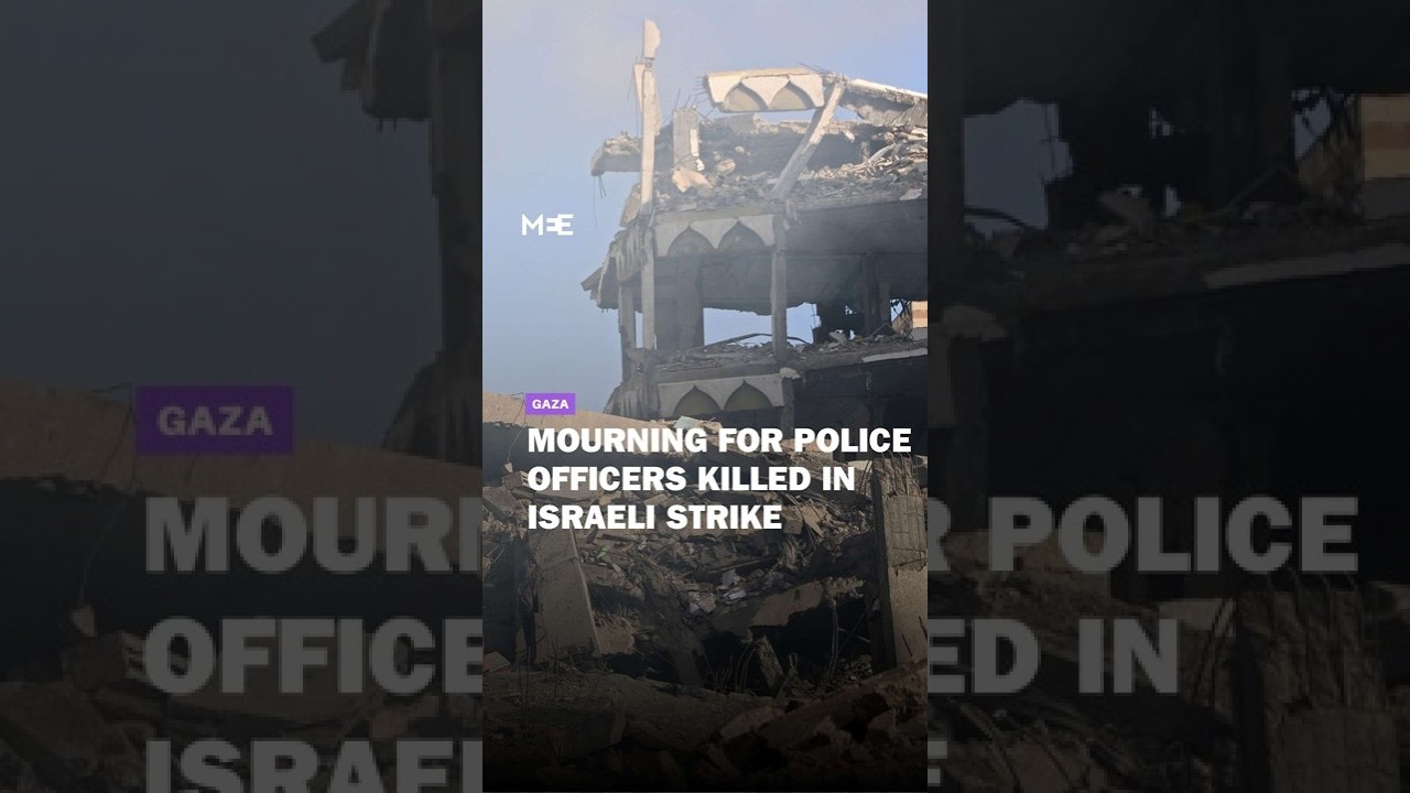 Palestinians in Gaza mourn the deaths of two reported police officers in Israeli strike