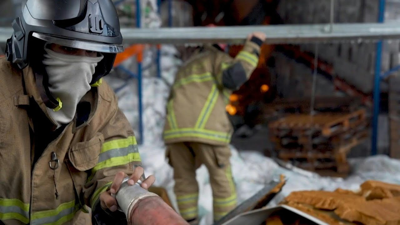 Lebanon firefighters try to put out huge fire at Beirut port | AFP