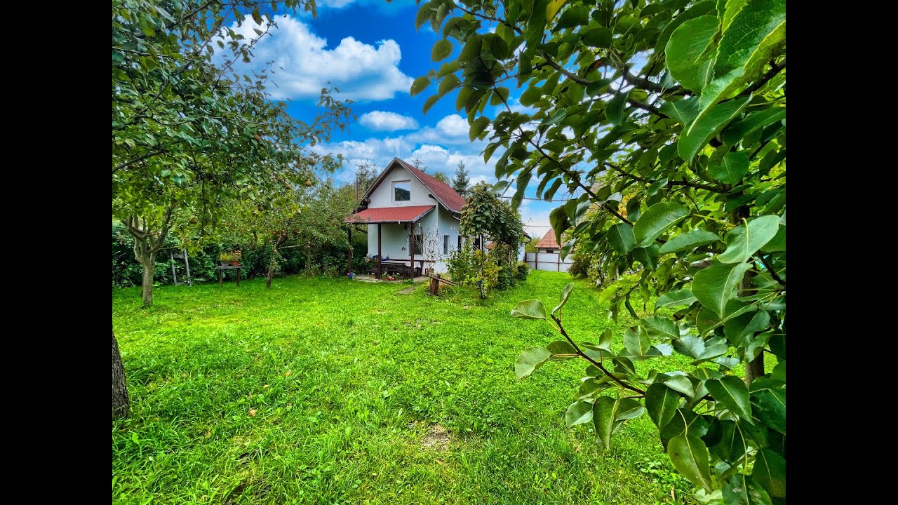 Casa de vacanta cu livada si teren de 1000 mp langa Brasov