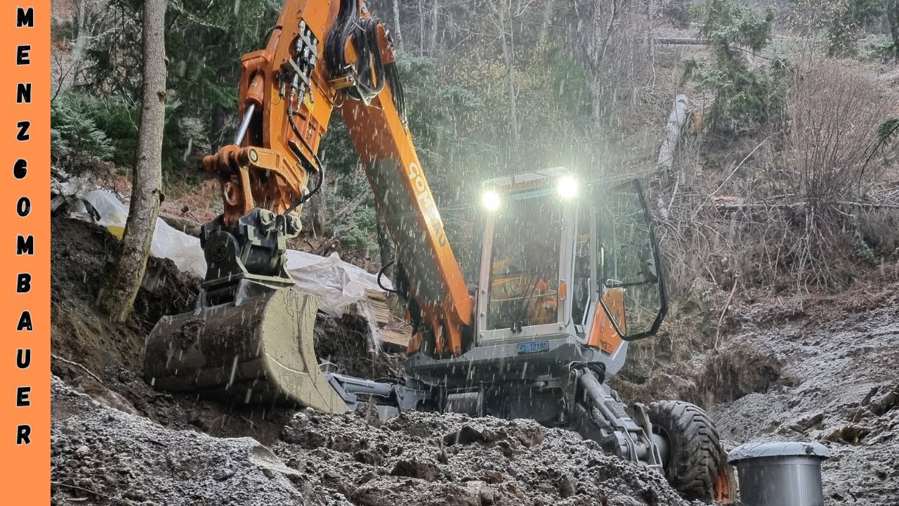 Menzi Muck m335 Goms Fiesch Wir bedecken den Brunnen Schreitbagger Spider Excavator