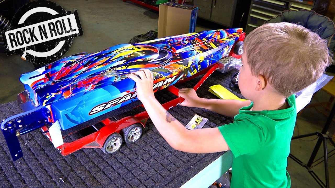 UNBOXiNG a TRAXXAS SPARTAN ROCK n' ROLL V-Hull SPEED BOAT w/ my Son! | RC ADVENTURES