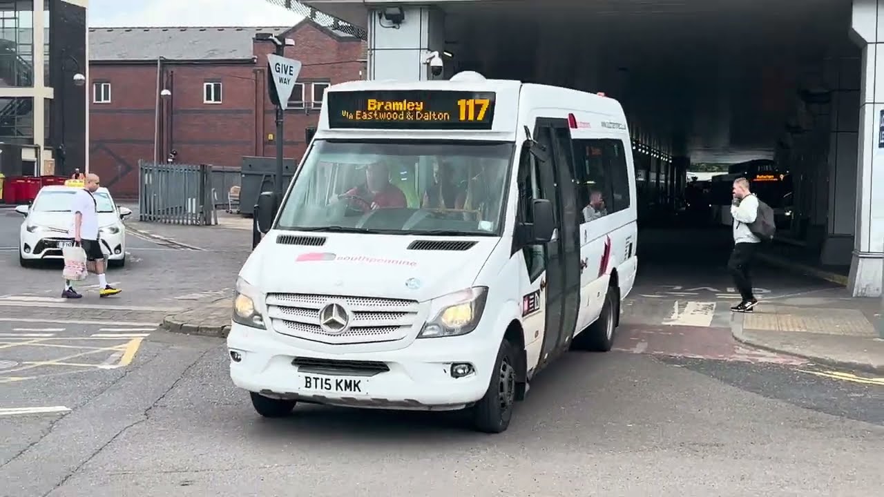 South Pennine Community Transport 241 departs Rotherham with a 117 service to Bramley