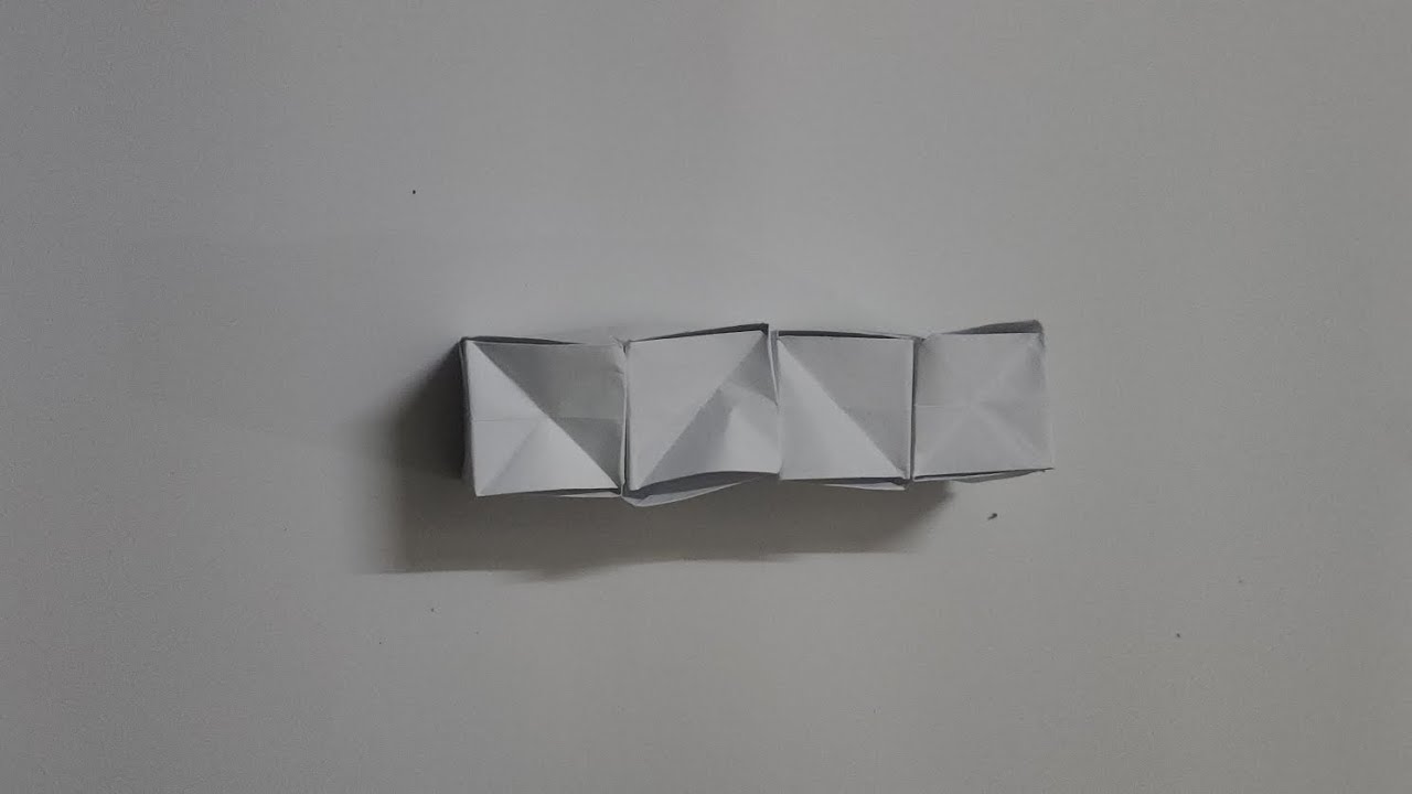 How to make a satisfying origami Paper Spring. #DIY #papercraft 