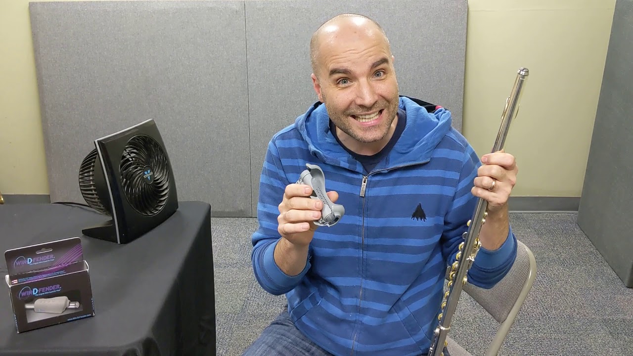 Win-D-Fender flute wind shield and tone reflector
