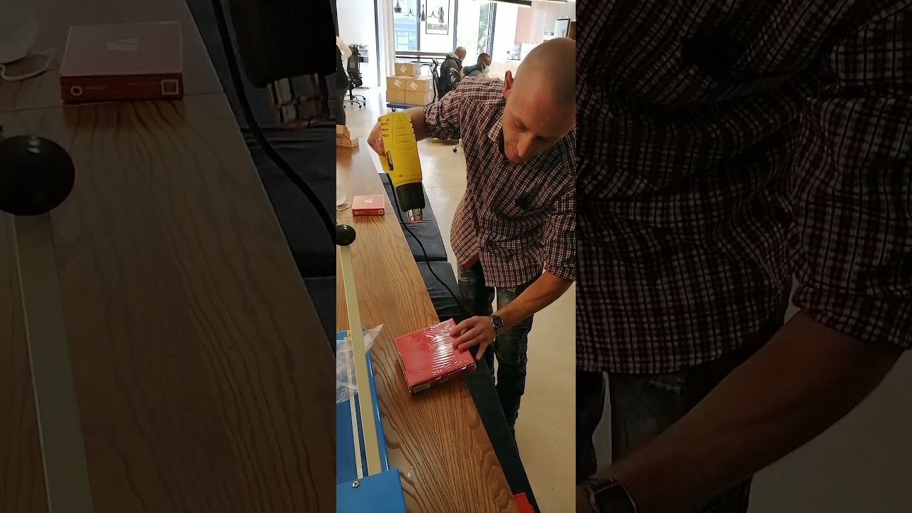 Shrink Wrapping a device using a YC-450HL I-bar sealer, Heat Gun and POF shrink film(client demo)